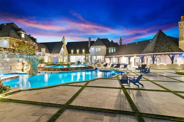 a view of a patio with swimming pool