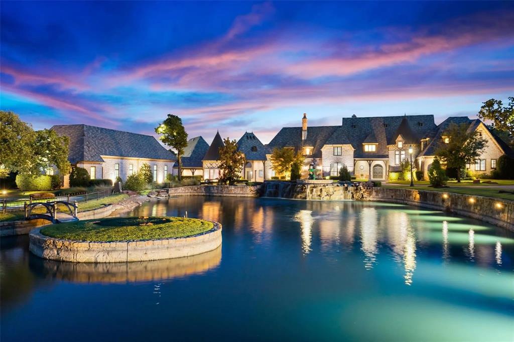935 West Dove Road Southlake, TX 76092 - Photo 35 of 38 a view of a lake with houses