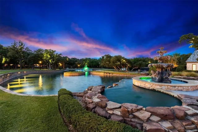 a view of a lake with a house