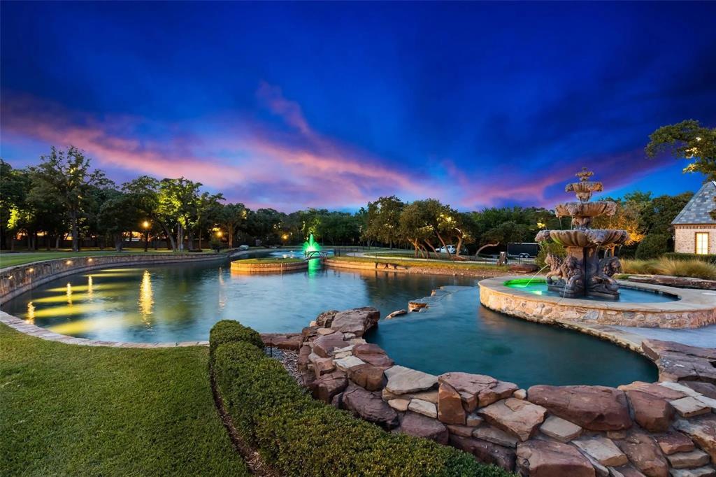 935 West Dove Road Southlake, TX 76092 - Photo 6 of 38 a view of a lake with a house