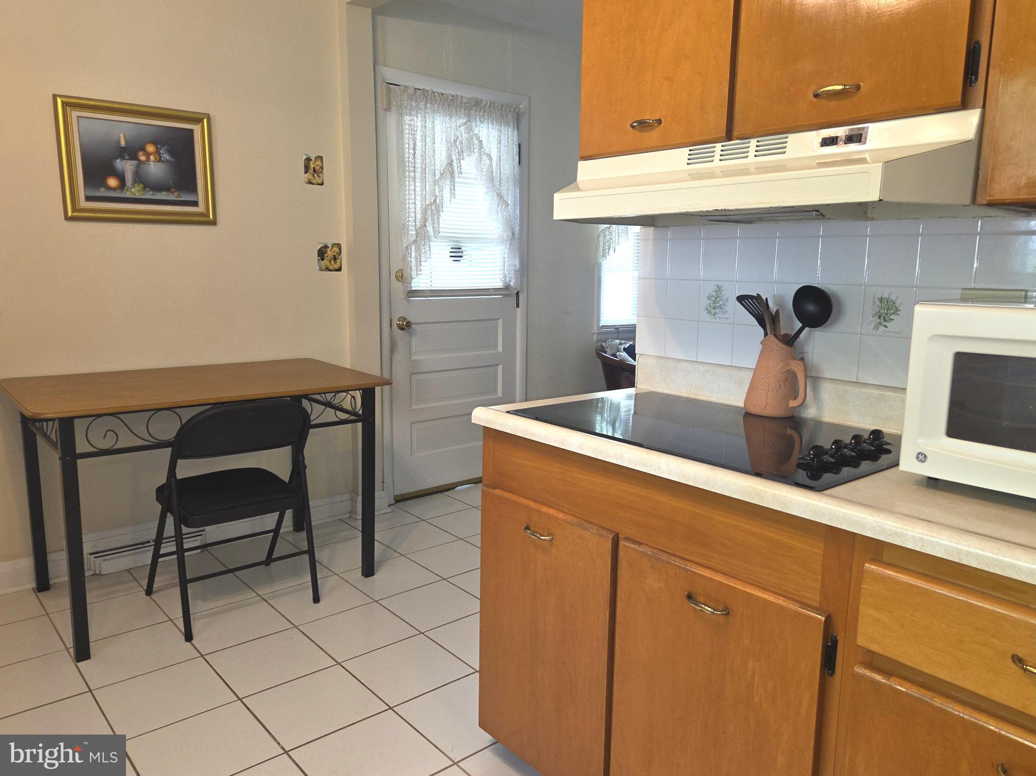 305 Bowleys Quarters Road Middle River, MD 21220 - Photo 14 of 55 a kitchen with a sink cabinets and appliances
