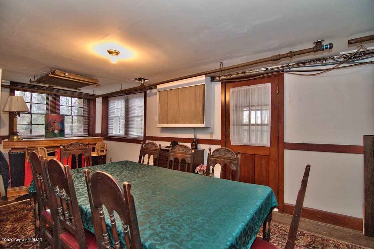 24 Summit Avenue Pocono Manor, PA 18349 - Photo 101 of 114 a view of a dining room with furniture