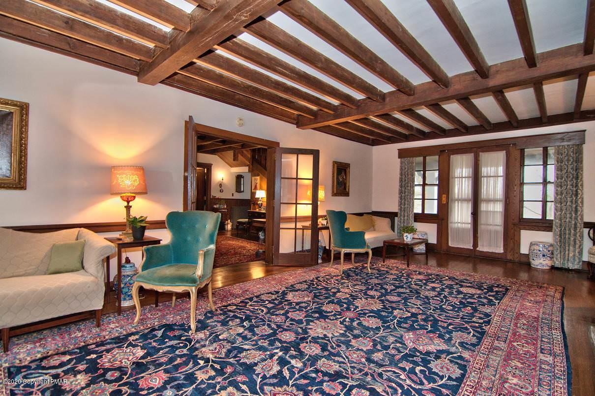 24 Summit Avenue Pocono Manor, PA 18349 - Photo 13 of 114 a living room with furniture and a table