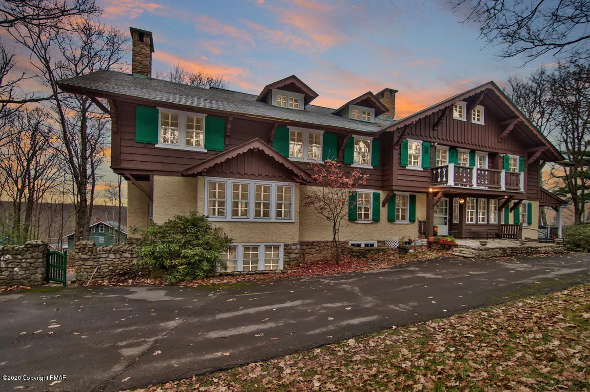 24 Summit Avenue Pocono Manor, PA 18349 - Photo 2 of 114 a front view of a building