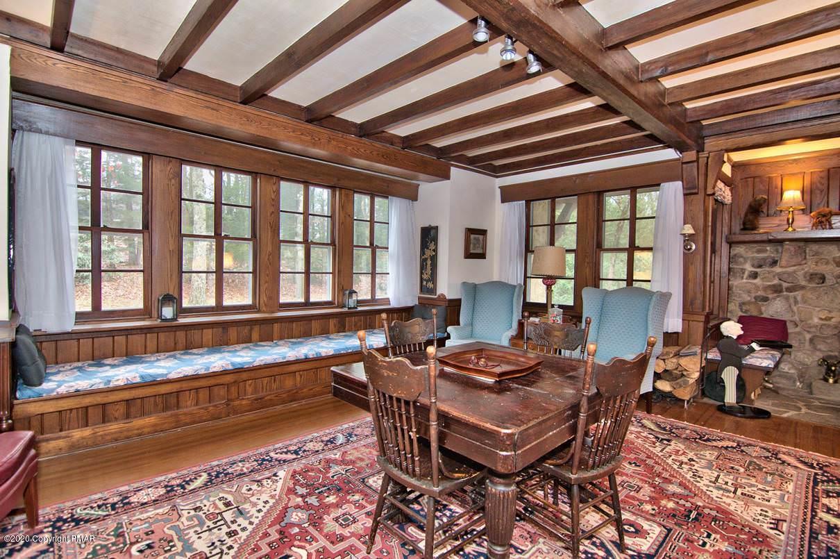 24 Summit Avenue Pocono Manor, PA 18349 - Photo 21 of 114 a living room with furniture and a floor to ceiling window