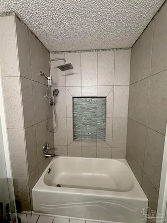 a bathroom with a tub