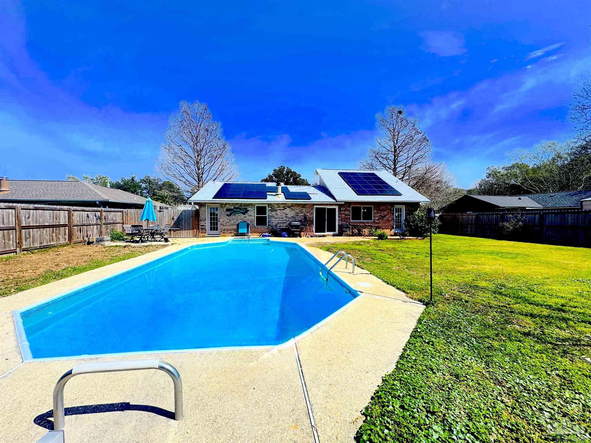 3585 Riddick Drive Pensacola, FL 32504 - Photo 19 of 22 a view of an swimming pool with seating area