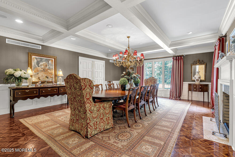 1762 Todd Road Toms River, NJ 08755 - Photo 29 of 69 a dining room with furniture a chandelier and wooden floor