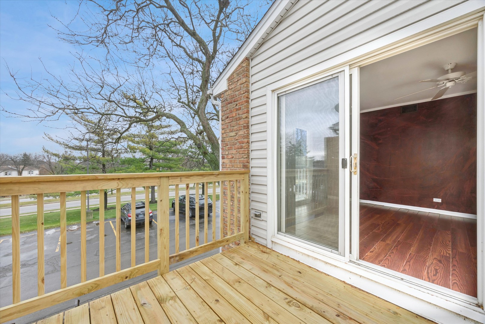 1860 Huntington Boulevard, Unit E Hoffman Estates, IL 60169 - Photo 7 of 16 a view of balcony with wooden floor