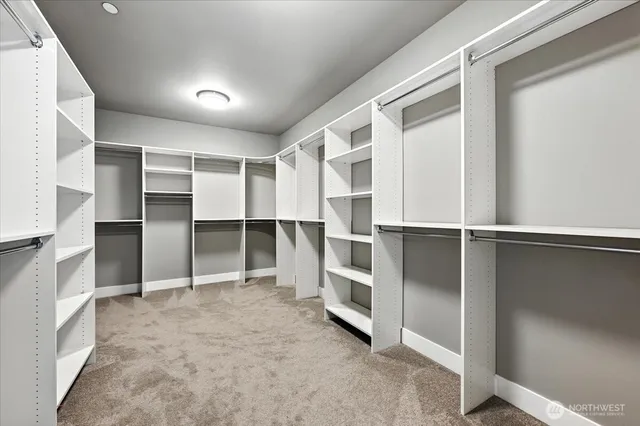 a view of an empty walk in closet