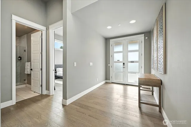 a view of entryway with wooden floor