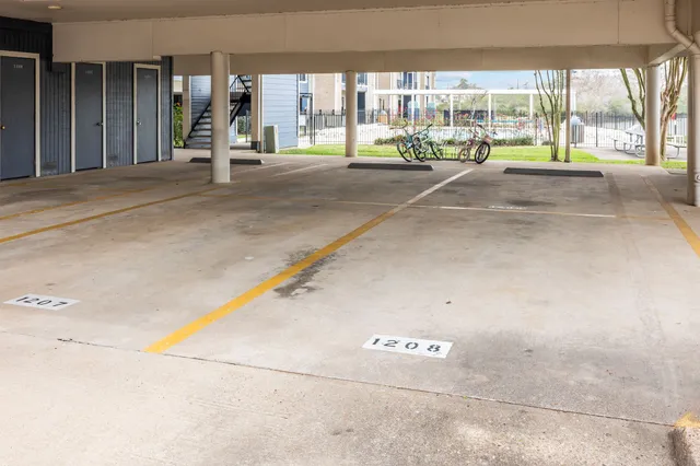 a view of a bench and chairs in the garden