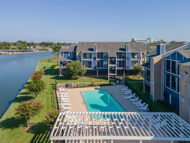 a view of a city with lawn chairs