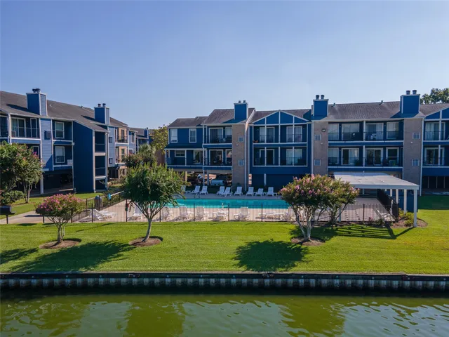 a view of a city from a lake view