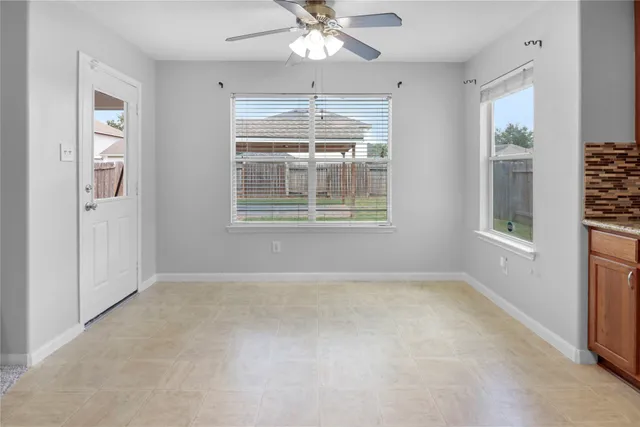 a bathroom with a toilet a sink and a mirror
