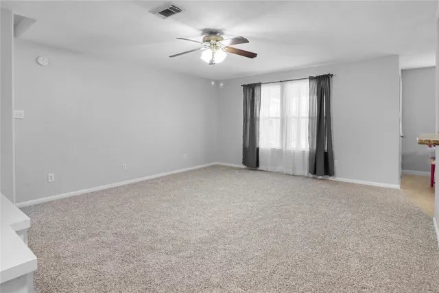 a view of a livingroom with a window