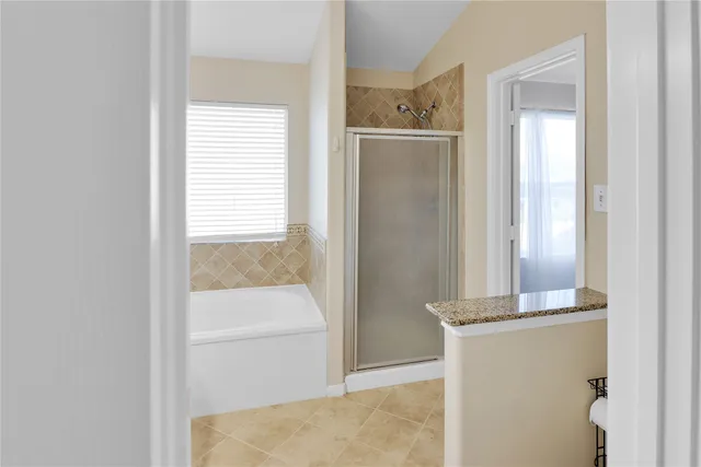 a view of hallway with an empty room