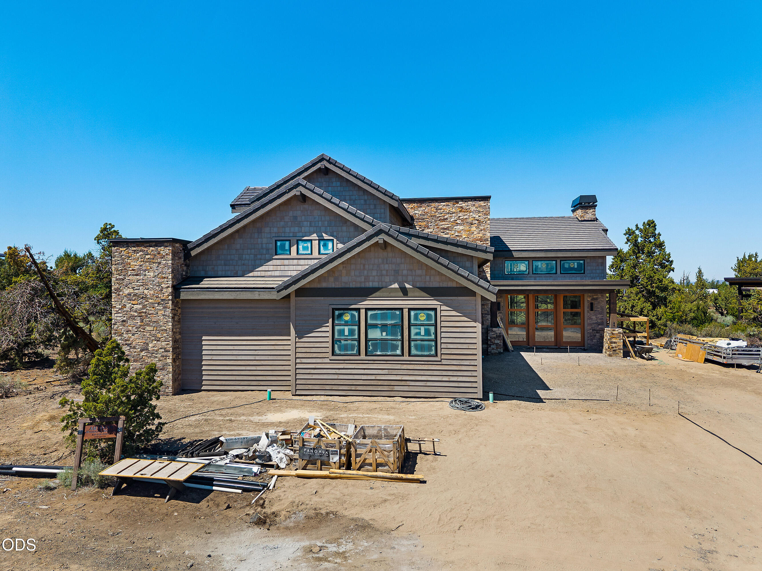 22936 Ghost Tree Lane Bend, OR 97701 - Photo 20 of 45 a front view of a house with a yard