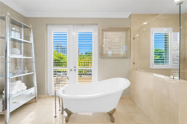 a bathroom with a bathtub and window