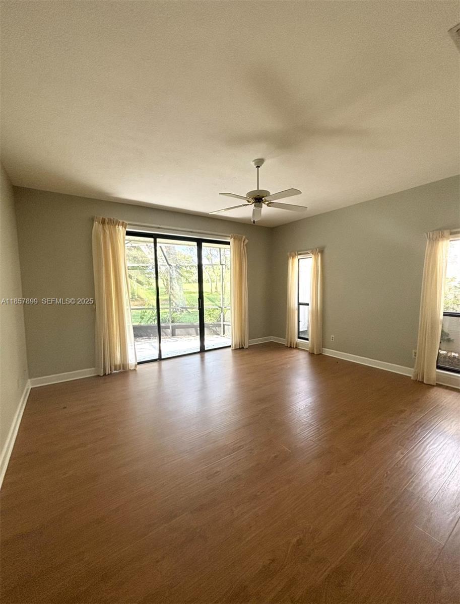 3356 North Bent Tree Point Lecanto, FL 34461 - Photo 16 of 25 a view of livingroom and hall with wooden floor