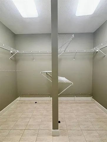 a view of a room with racks on the wall