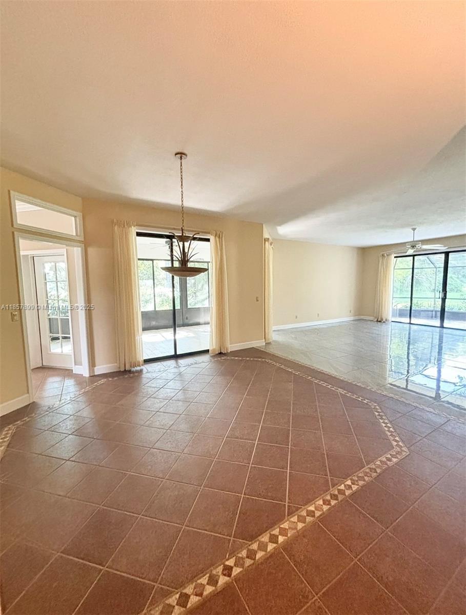 3356 North Bent Tree Point Lecanto, FL 34461 - Photo 7 of 25 a view of an empty room with glass door