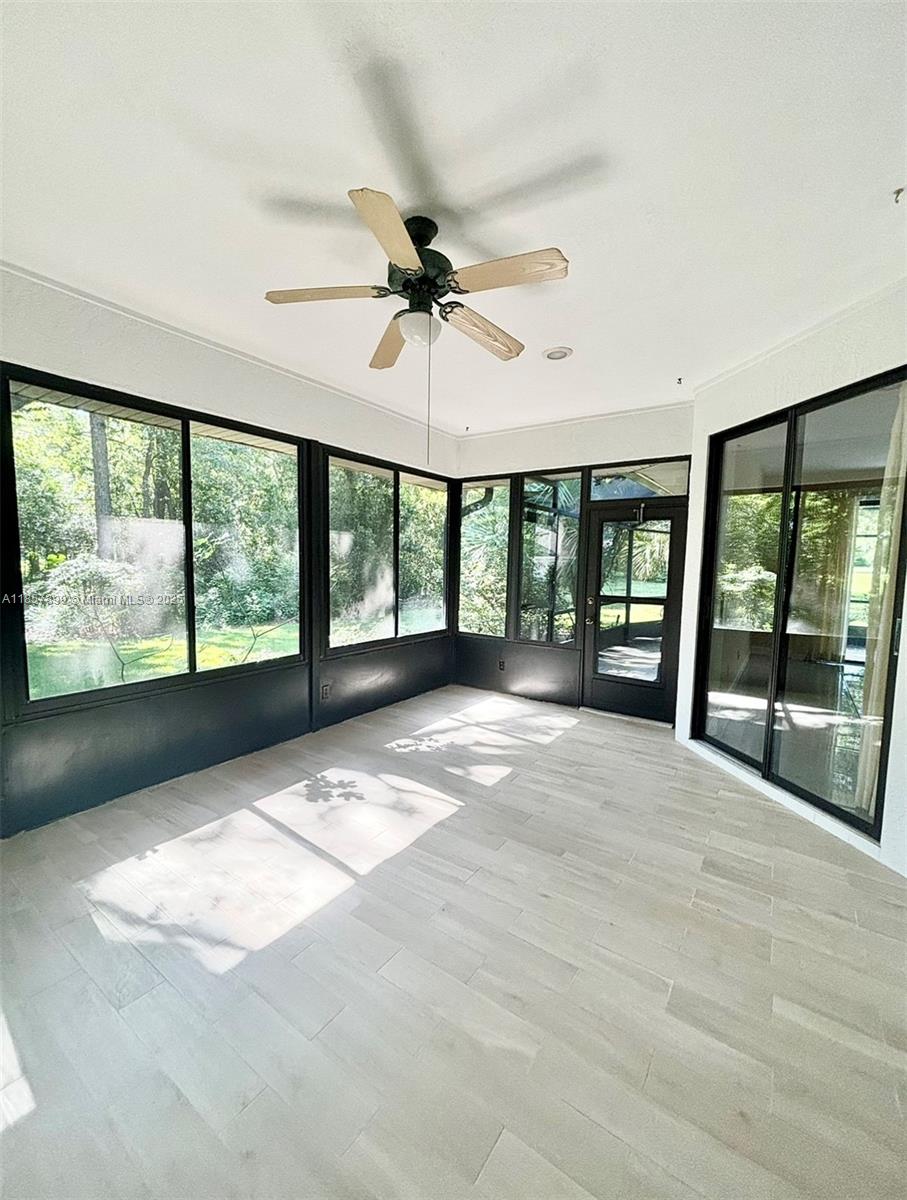 3356 North Bent Tree Point Lecanto, FL 34461 - Photo 9 of 25 a view of an empty room with a balcony