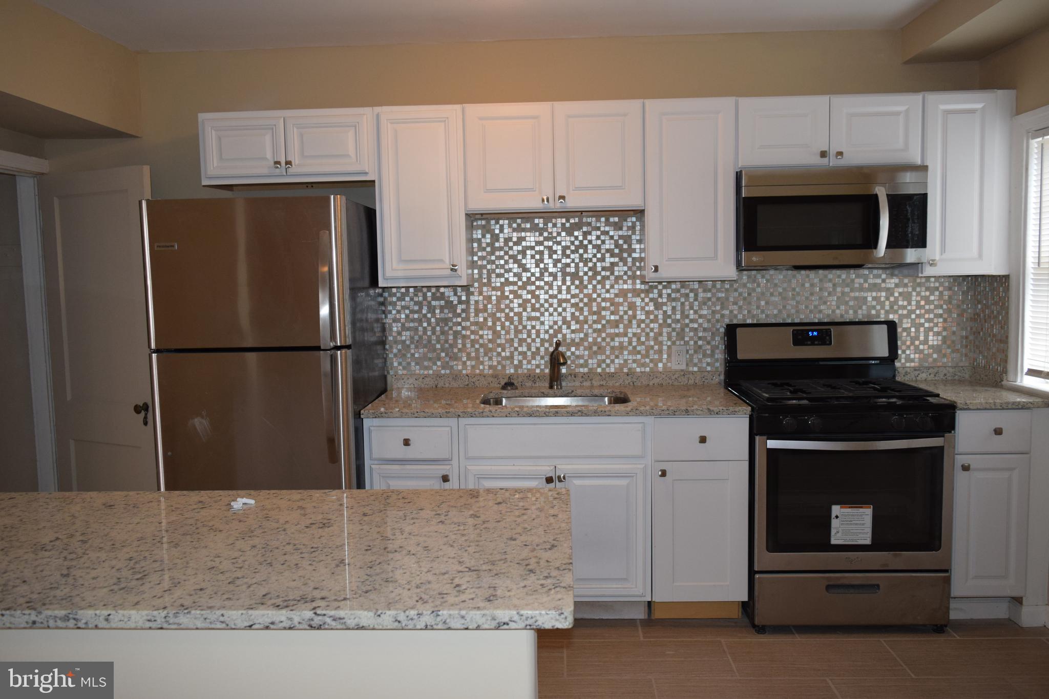 132 North Monastery Avenue Baltimore, MD 21229 - Photo 1 of 45