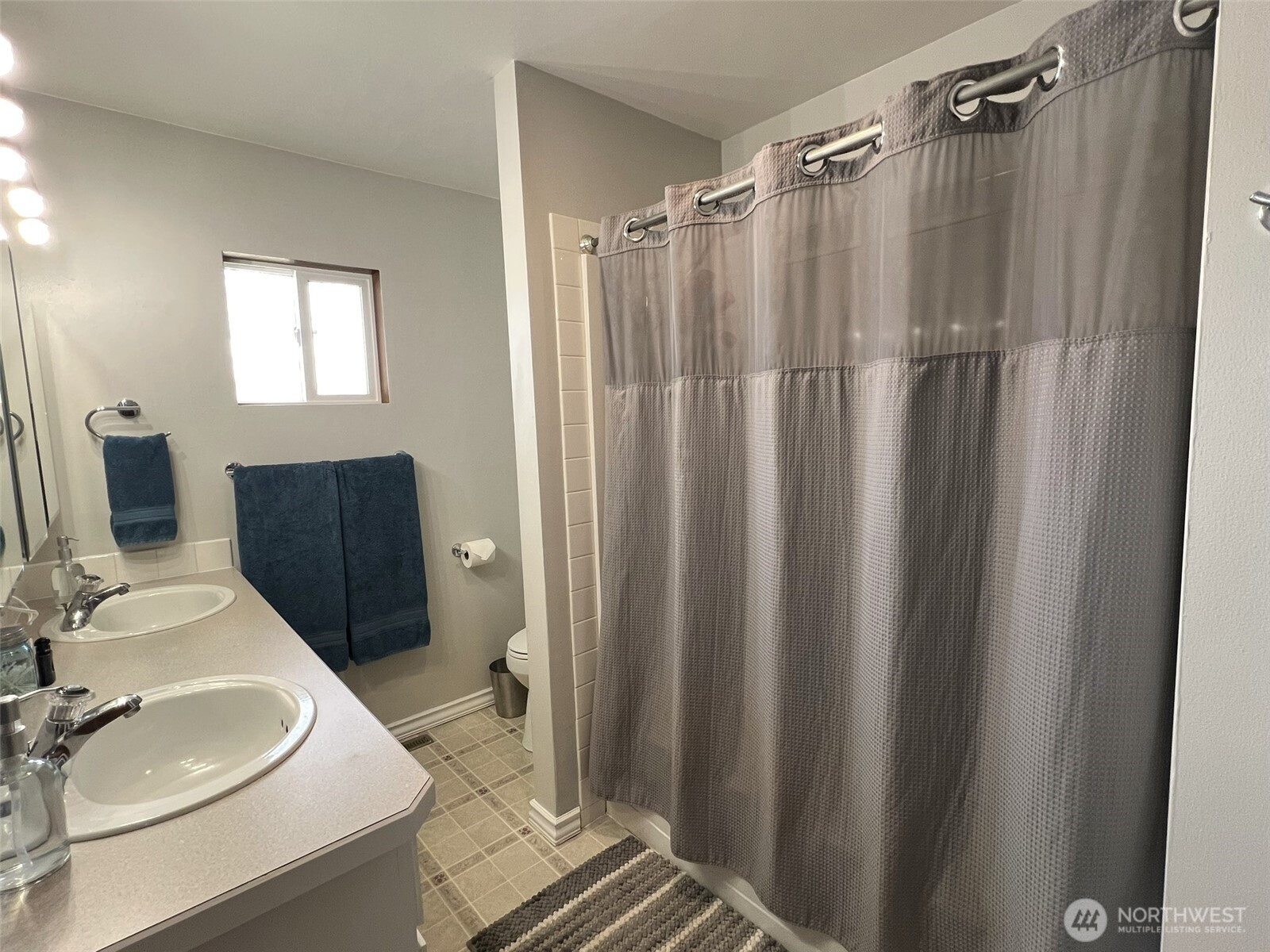 81 B Golden Road Oroville, WA 98844 - Photo 12 of 37 a bathroom with a sink toilet and shower