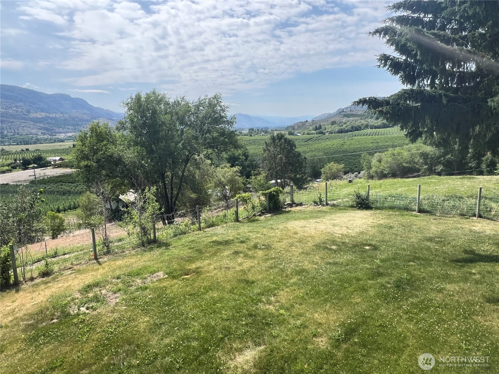 81 B Golden Road Oroville, WA 98844 - Photo 26 of 37 a view of outdoor space with garden and trees