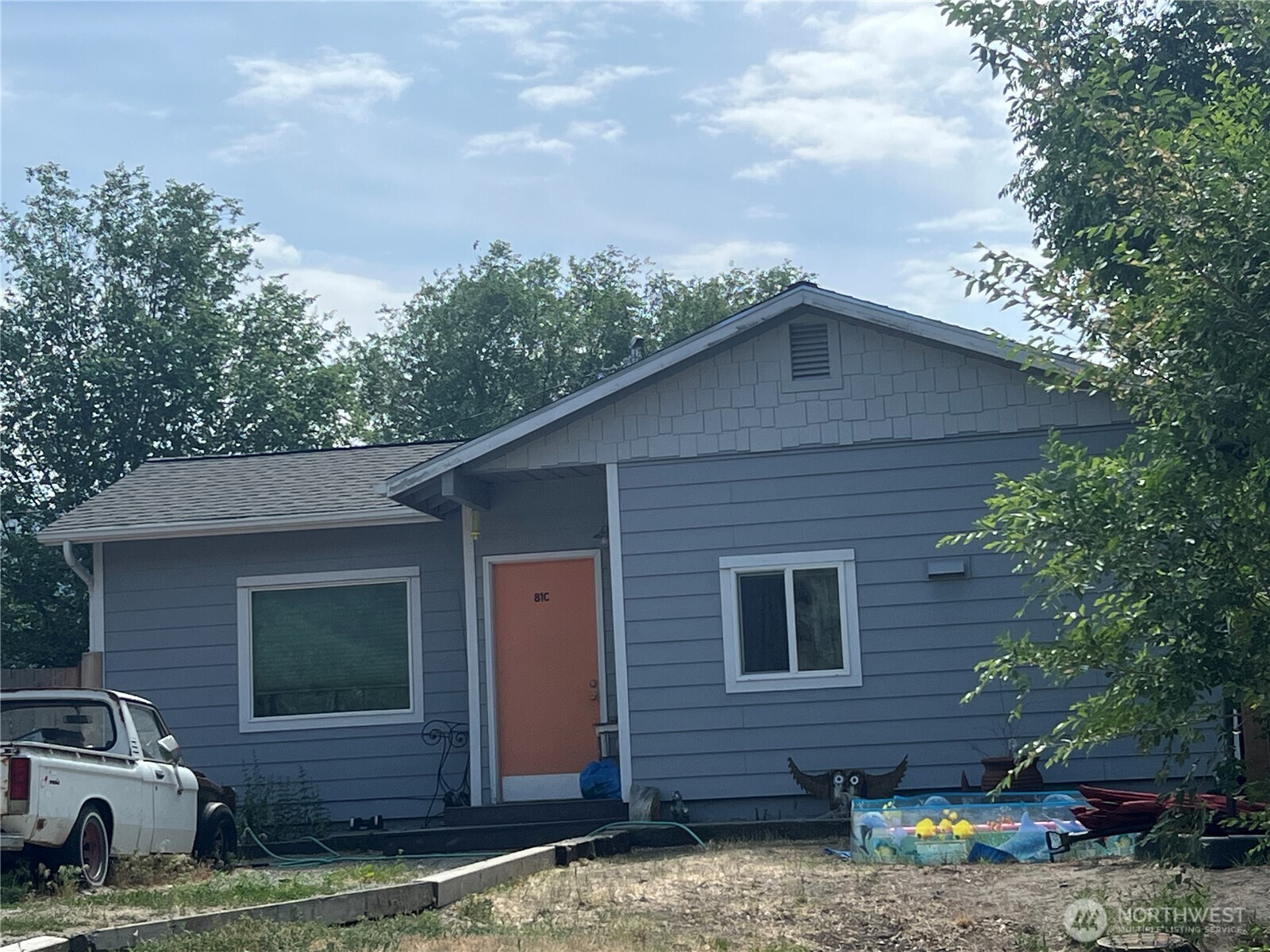 81 B Golden Road Oroville, WA 98844 - Photo 35 of 37 a front view of a house with garden