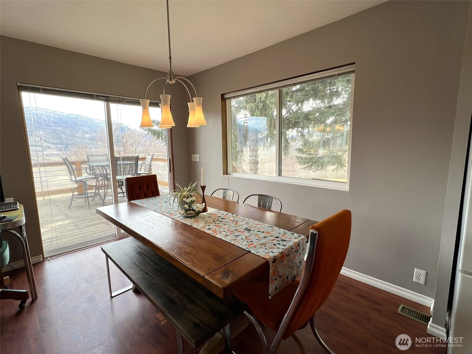 81 B Golden Road Oroville, WA 98844 - Photo 9 of 37 a dining room with furniture window wooden floor
