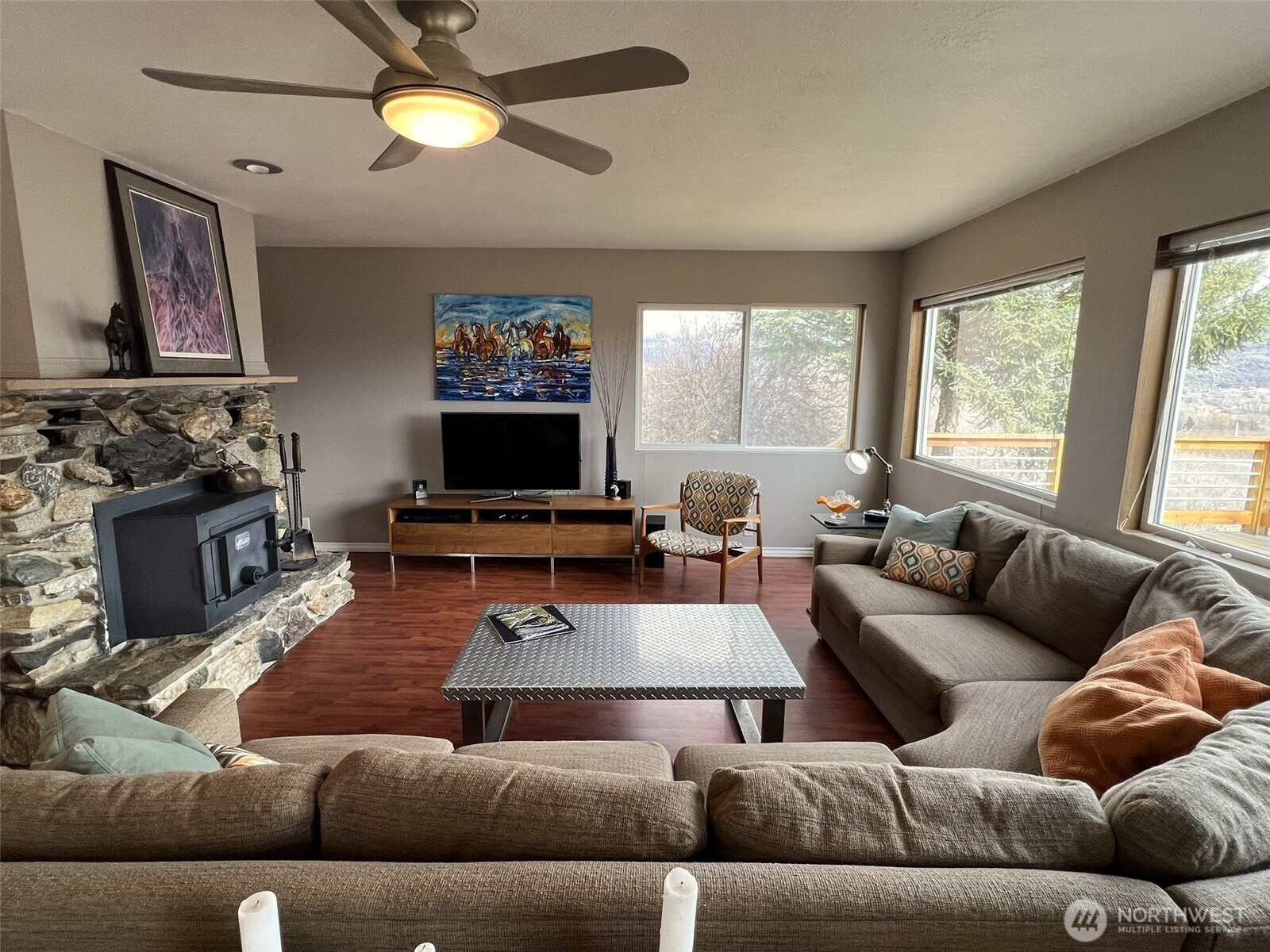 81 B Golden Road Oroville, WA 98844 - Photo 10 of 37 a living room with furniture and a flat screen tv