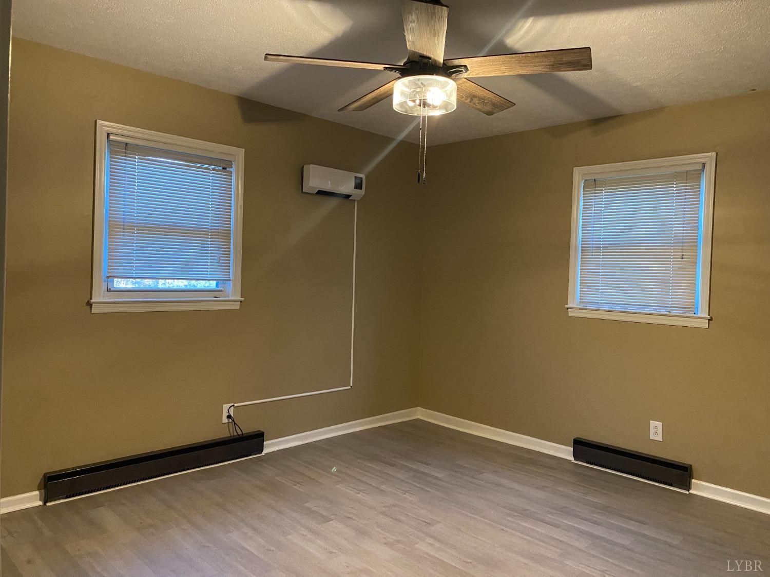 5936 Riceville Road Gretna, VA 24557 - Photo 11 of 19 a view of an empty room with a window