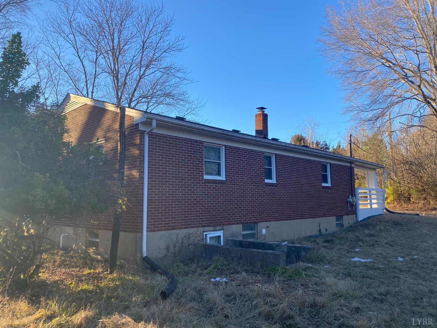 5936 Riceville Road Gretna, VA 24557 - Photo 4 of 19 a view of a house with a yard