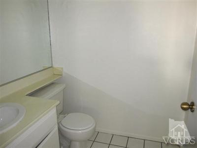1195 Fitzgerald Road Simi Valley, CA 93065 - Photo 11 of 21 a bathroom with a toilet and a sink