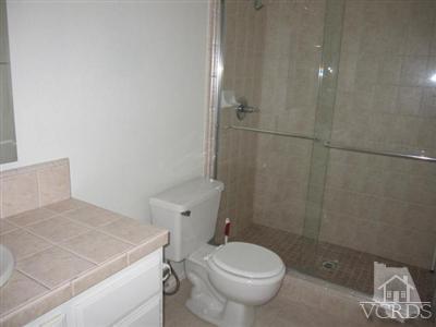 1195 Fitzgerald Road Simi Valley, CA 93065 - Photo 15 of 21 a bathroom with a sink and toilet