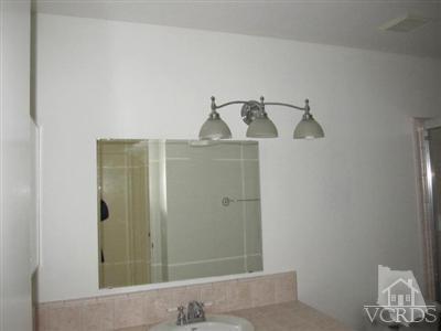 1195 Fitzgerald Road Simi Valley, CA 93065 - Photo 17 of 21 a bathroom with a shower