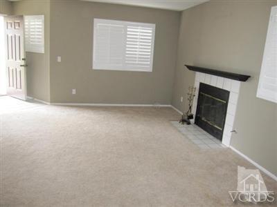 1195 Fitzgerald Road Simi Valley, CA 93065 - Photo 2 of 21 an empty room with a fireplace
