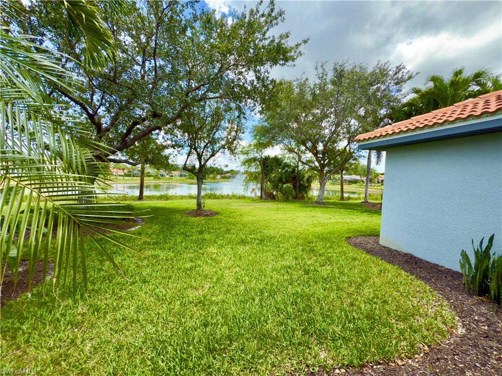 19639 Villa Rosa Loop Estero, FL 33967 - Photo 2 of 2 View of grassy yard with a water view