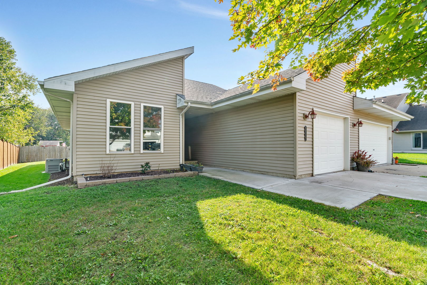 210 Kevin Drive Diamond, IL 60416 - Photo 1 of 23 a view of a backyard with a garden and plants