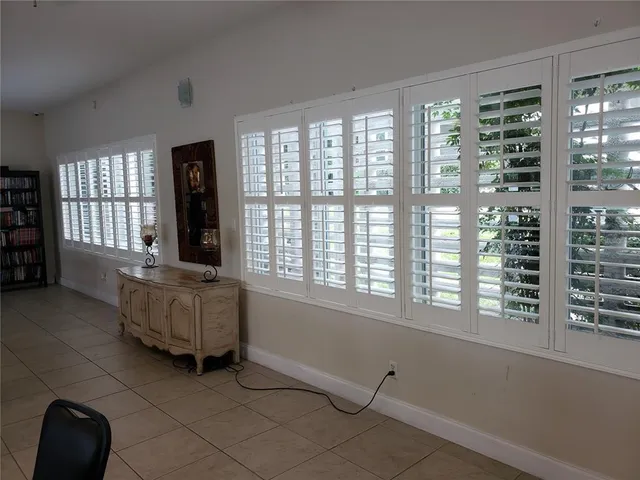 a view of a lake with outdoor seating