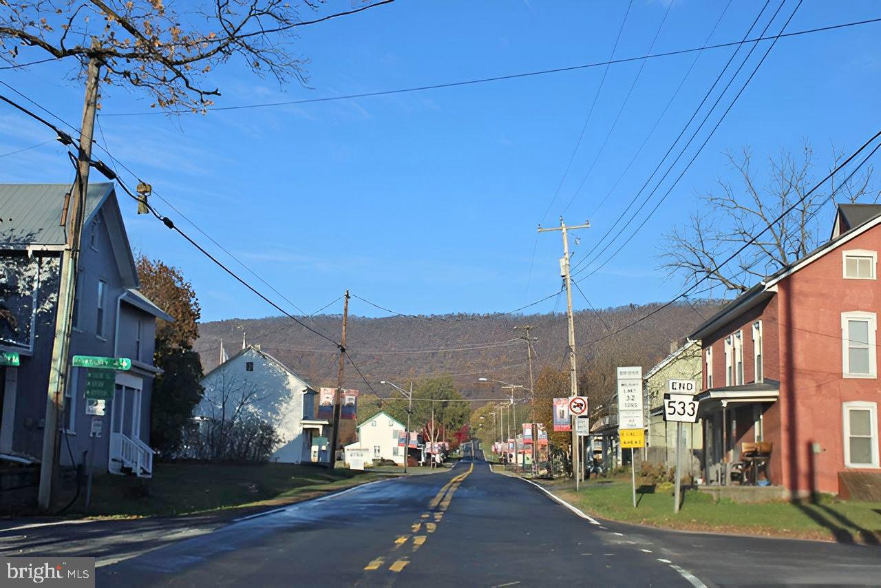 9635 Upper Strasburg Road Pleasant Hall, PA 17246 - Photo 21 of 21 a view of a street with a building in the background