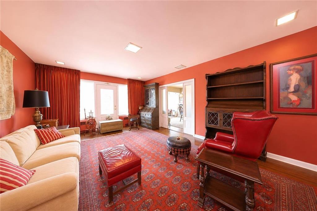 1 Bay Ridge Parkway Brooklyn, NY 11209 - Photo 10 of 38 a living room with furniture a large window and a flat screen tv