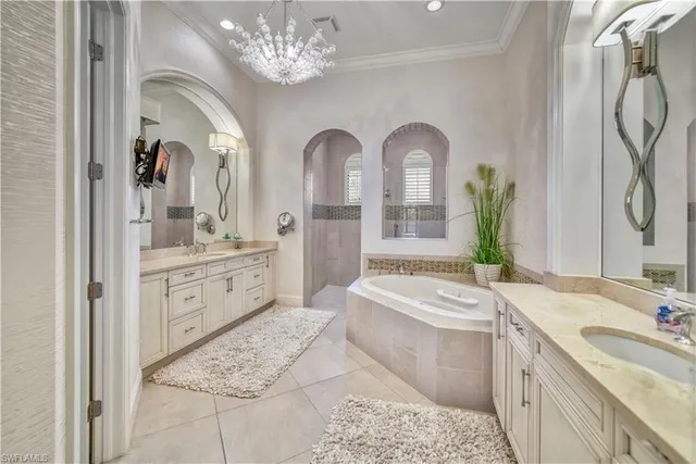 a spacious bathroom with a double vanity sink mirror and
