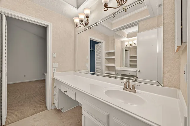 a bathroom with a sink double vanity and a mirror