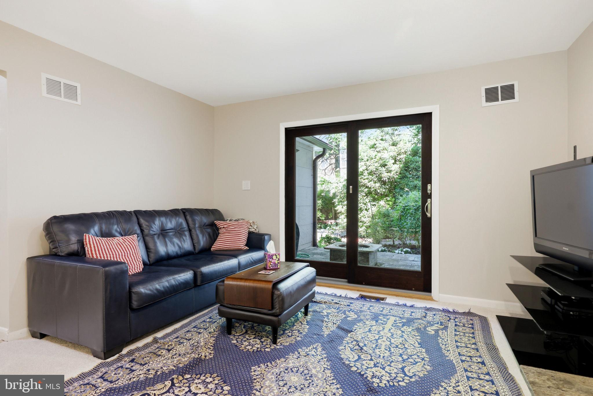 8578 Brickyard Road Potomac, MD 20854 - Photo 29 of 83 Family room on main floor to patio