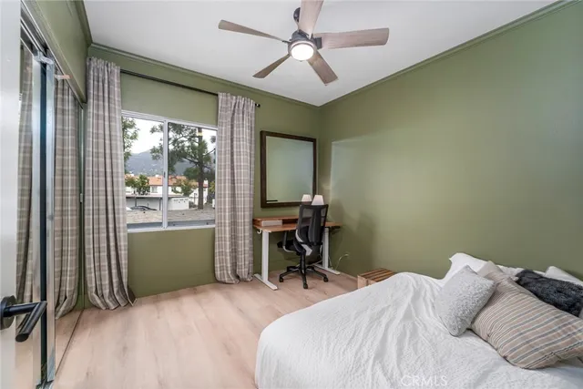 a bedroom with a bed and a table