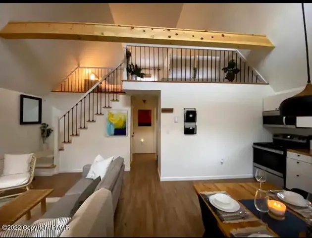 a view of a workspace with furniture and toys