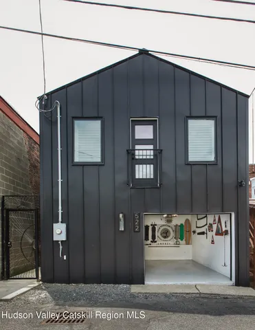 a view of a refrigerator and window